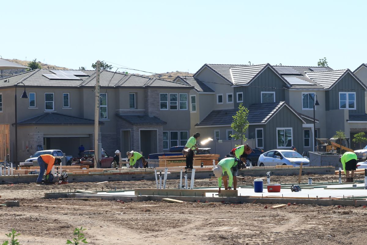 Construction workers on an active residential building site
